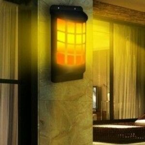 Hangulatos láng hatású napelemes fali lámpa, dekoráció kép